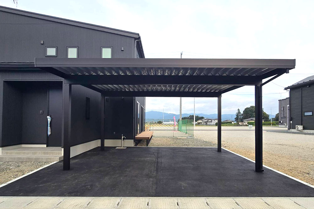 カーポート＋アスファルト舗装 | 有限会社新栄建設工業の施工事例